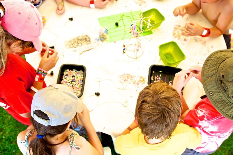 Making bracelets and bag danglers.  Photo by www.cheltphoto.co.uk