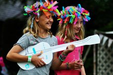 Festival headresses and a cardboard guitar.Photo by Andrew Joules.